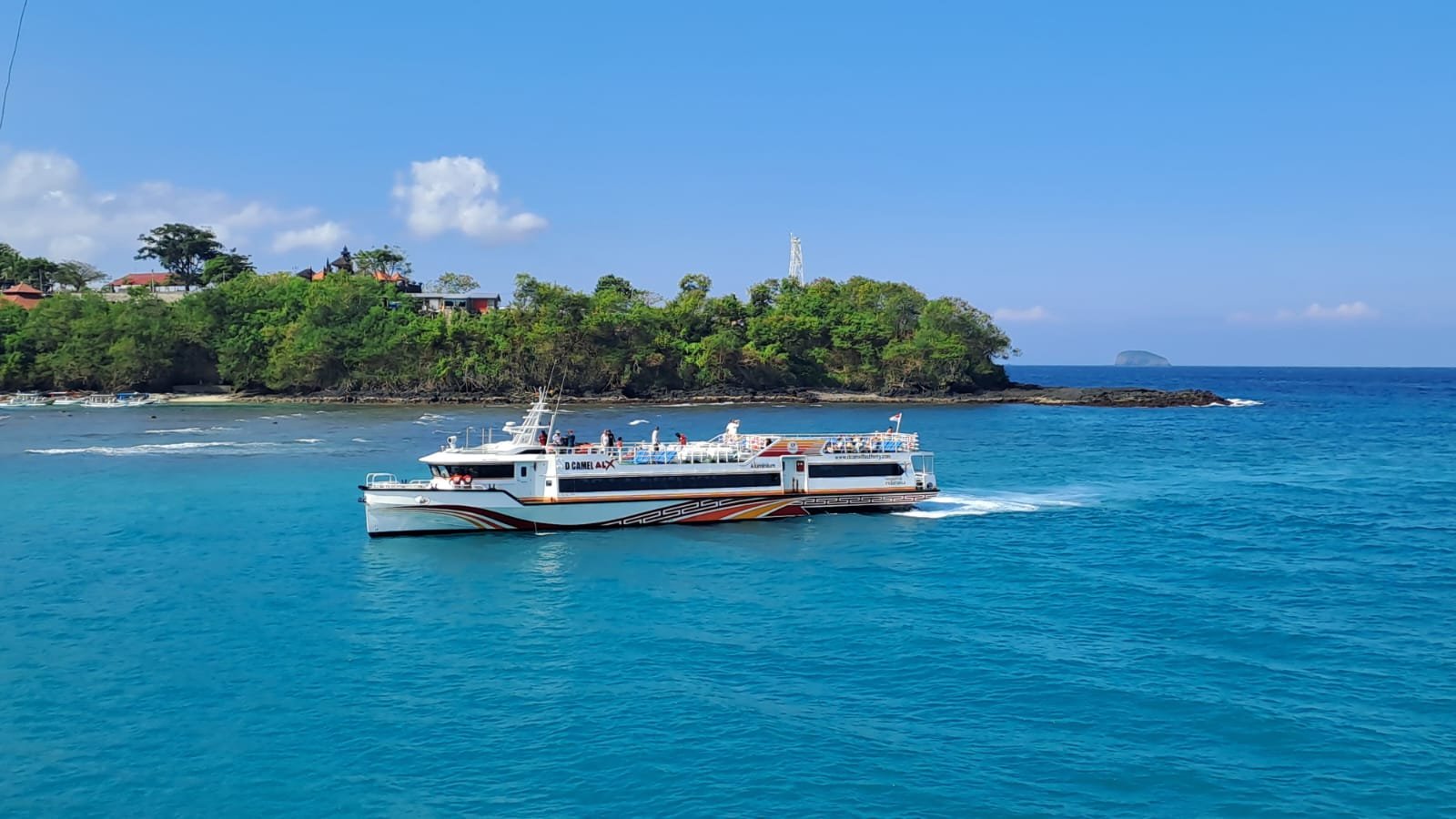 Samaya One fast boat D Camel A4X crossing turquoise water